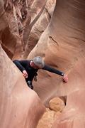 Father surmounting a small obstacles in Little Wild Horse Canyon